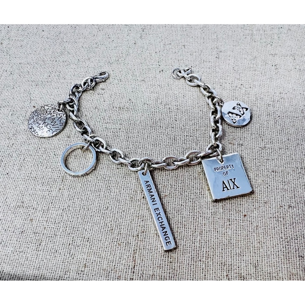 Armani Exchange AX Silver Tone Multi Charm Logo Bracelet Crystal Accents 8.5"
